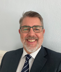 Head shot of Scott MaCcoll, City Manager